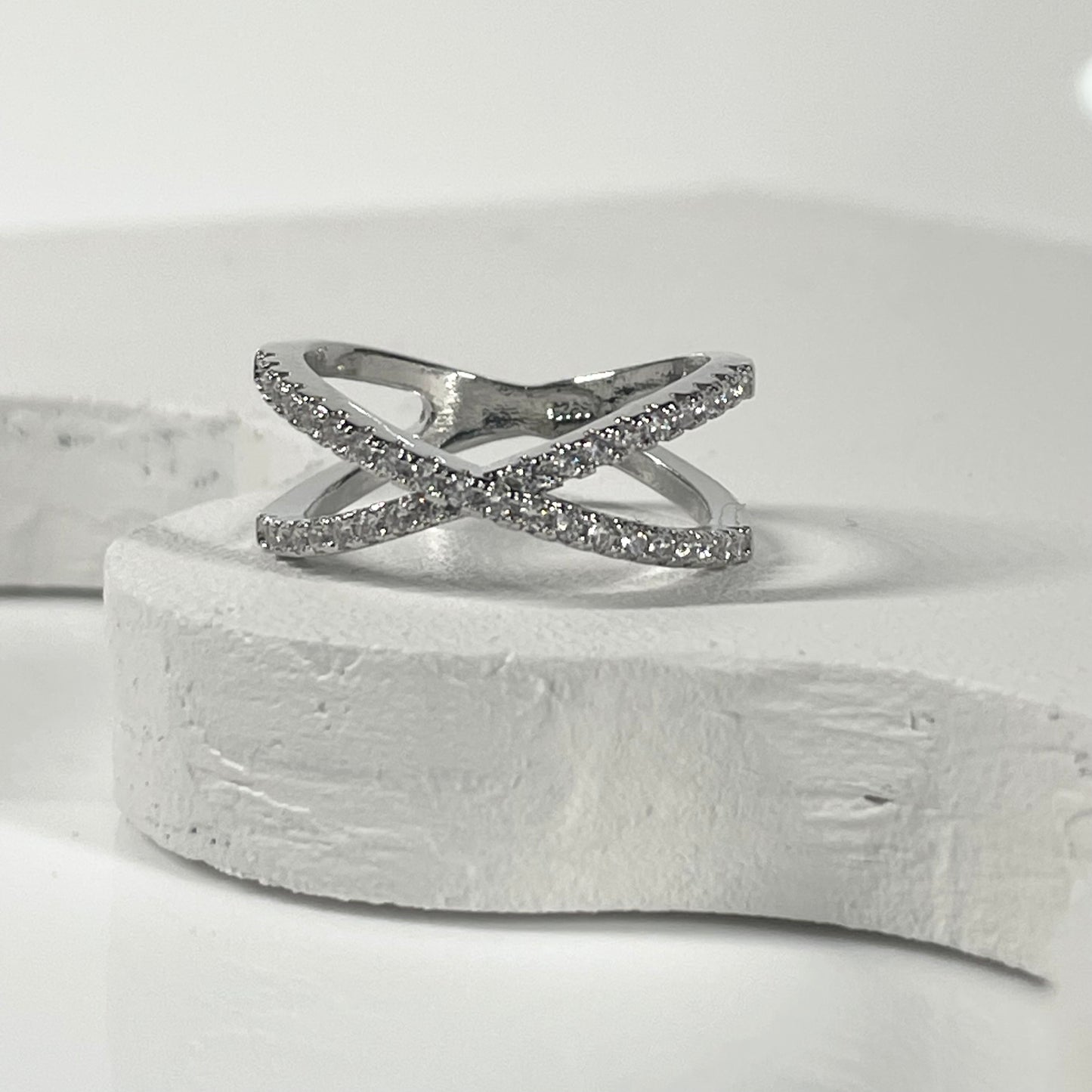 cross bow ring with pave cubic zirconia